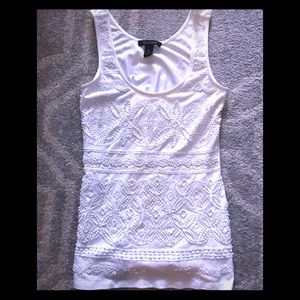 Off white beaded front tank top.